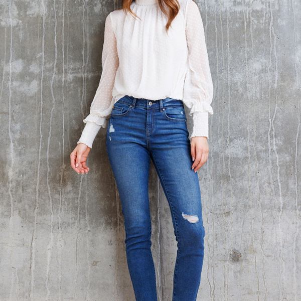 Mid Rise Destructed Skinny Jeans