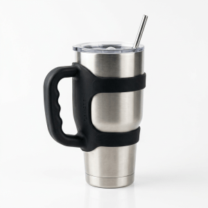 Stainless steel travel mug with black handle, lid, and straw